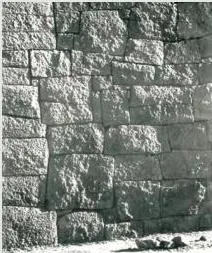 An Imperial Capital Class 12: Vijayanagara Chapter PDF Rough stone blocks of the Vijayanagara city wall laid without mortar in tapered courses, showing the massive fortification described in the chapter