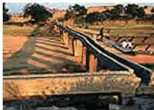 An Imperial Capital Class 12: Vijayanagara Chapter PDF Stone aqueduct channel carrying water into the royal centre of Vijayanagara, evidence of the city's elaborate water supply system