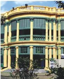Colonialism and the Countryside: NCERT Class 12 History Chapter 1 The grand City Palace of the Burdwan raja in Calcutta with tall columns and a wide entrance, displaying zamindari wealth