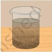 Exploring Mixtures and their Separation Class 9 Notes A clear, colourless liquid in a glass representing a homogeneous mixture such as sugar in water, where every part looks identical