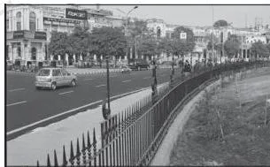 NCERT Class 12 Geography Chapter 2: Human Settlements (India: People and Economy) Dense, compact, multi-storey buildings of a modern city centre, the built-up urban environment the chapter contrasts with rural villages
