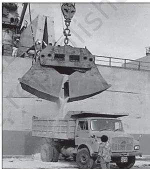 Cargo being unloaded at a port, showing the physical work that makes a port a gateway for a country's imports and exports