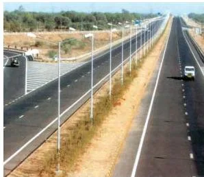 Lifelines of National Economy Class 10: NCERT Chapter 7 PDF The Ahmedabad-Vadodara Expressway with traffic on a divided multi-lane highway, a working example of India's super highway project