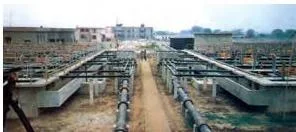 Photograph of a sewage treatment plant built under the Yamuna action plan at Faridabad, showing tanks where effluents are treated before release