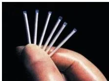 Small progestogen-releasing rods placed under the skin of the arm, giving long-term contraceptive action like the pill