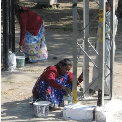 Sectors of the Indian Economy Class 10: Chapter PDF Labourers doing manual work at a rural employment site, the chapter's illustration that long-term employment suggestions need short-term measures such as the Right to Work law