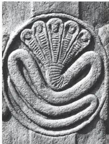Thinkers, Beliefs and Buildings Class 12 PDF (Theme 4) A coiled serpent carved on a pillar at Sanchi, a popular motif that was not recorded in texts