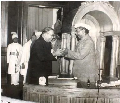 B. R. Ambedkar and Rajendra Prasad greeting each other at the handing over of the Constitution, closing the Constituent Assembly's work