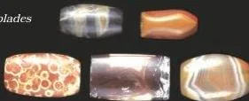 Beads, cubical weights and blades from Harappan sites — the weights were unmarked chert cubes following a binary and decimal system