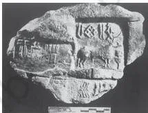 A large Dholavira signboard covered with symbols and letters of the Harappan script, evidence that writing was used on public objects